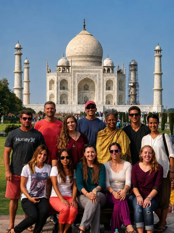 A group of international travellers in front of the Taj Mahal at Agra