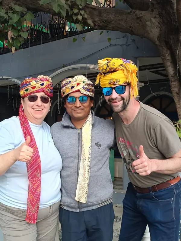 Two guests wearing Rajasthani turbans with their driver