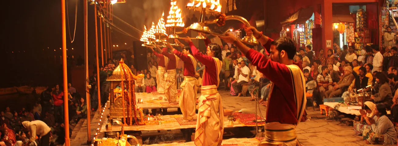 Priests performing the evening Ganga Aarti on the ghats of Varanasi